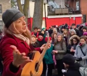 Leading hundreds of singers outside of Leonard Cohen's home, Nov. 12, 2016